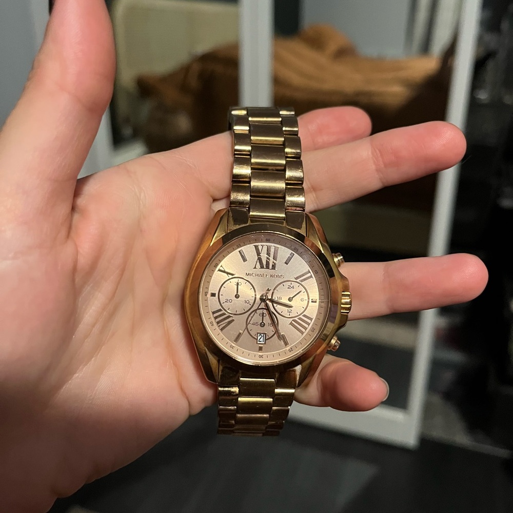 Womens Michael Kors watch. Needs new battery.